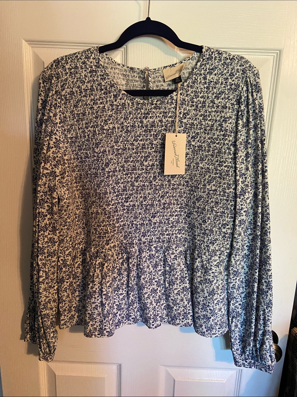 White and Blue Floral Peplum Long Sleeve Top